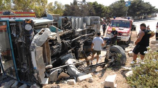 The Coast Road close to St Andrews was closed to traffic yesterday after a refuse truck overturned injuring the driver, Kevin Farrugia of Żurrieq. Photo: Jason Borg.