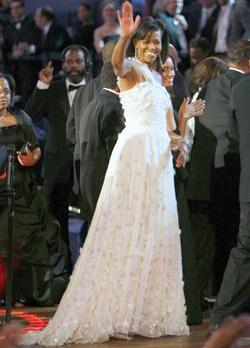 Michelle Obama in her white, one-shouldered chiffon gown with a full skirt by Taiwan-born US designer Jason Wu, 26.