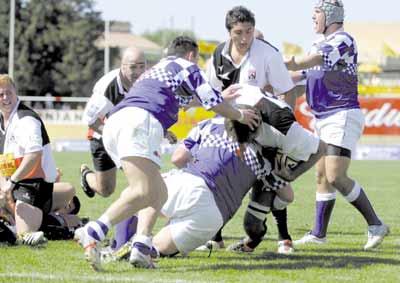 Paul Marzella (right) watching team-mate Domenic St George defending possession for Malta after a scrum against Croatia