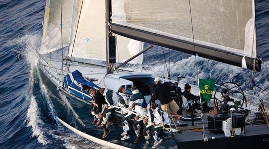 Moneypenny breaking the waves at the Rolex Middle Sea Race.
