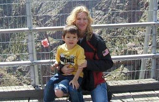 Jamie Paulin-Ramirez, 31,with her son Christian. Photo: Courtesy of Christine Mott/AP.