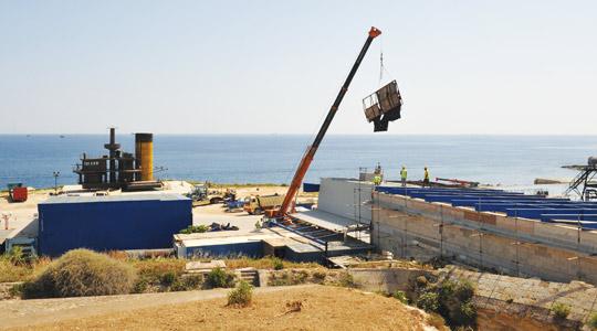 The illegal structure at the Malta Film Facilities near Kalkara, being dismantled. Photo: Chris Sant Fournier.