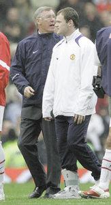 Wayne Rooney with Man. United manager Alex Ferguson.