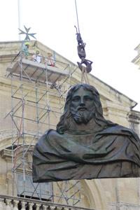 The replica of Algardi`s high relief of Christ the Saviour being raised into position on the fa&ccedil;ade of St John`s Co-Cathedral in Valletta. Picture: Dane Munro